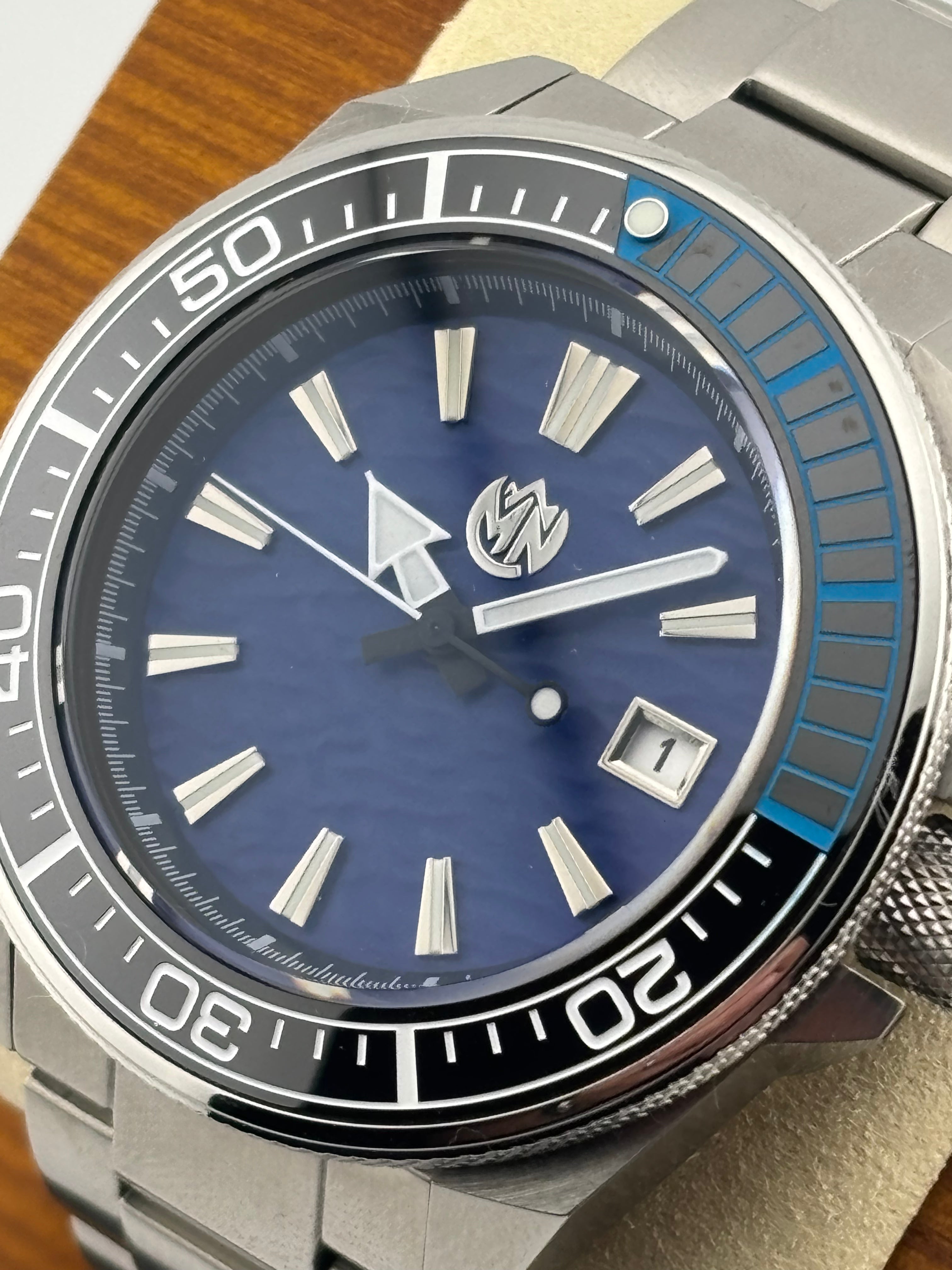 MN Watches luxury mechanical dive watch with textured dial, ceramic bezel, stainless steel case & bracelet