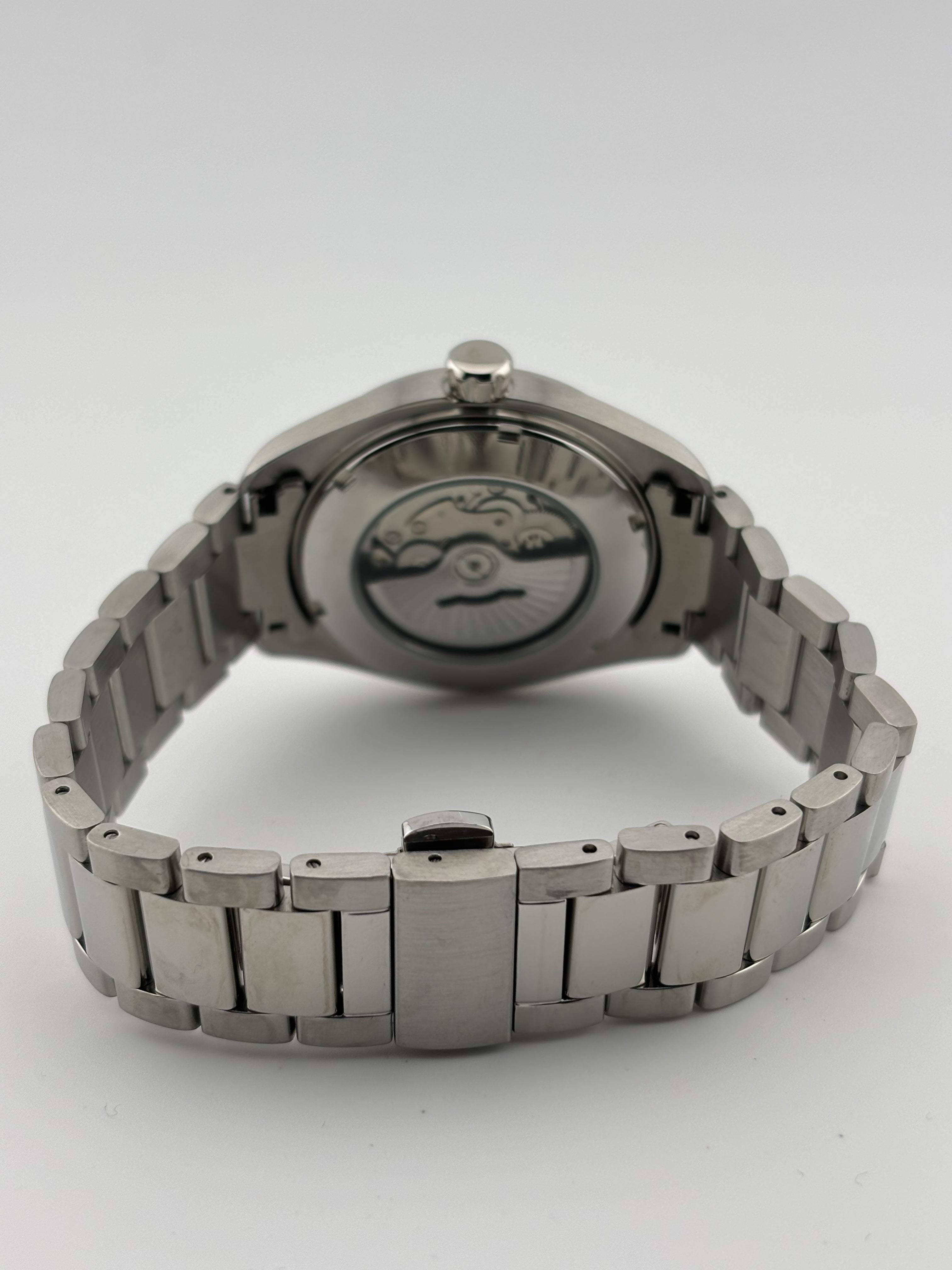 Mechanical sports watch with stainless steel case and bracelet, lumed hands and markers